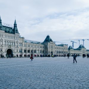 Historic GUM department store facade at Red Square under a cloudy sky, Moscow, Russia.